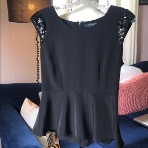 Black sequined peplum blouse